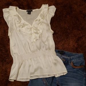 White ruffled blouse